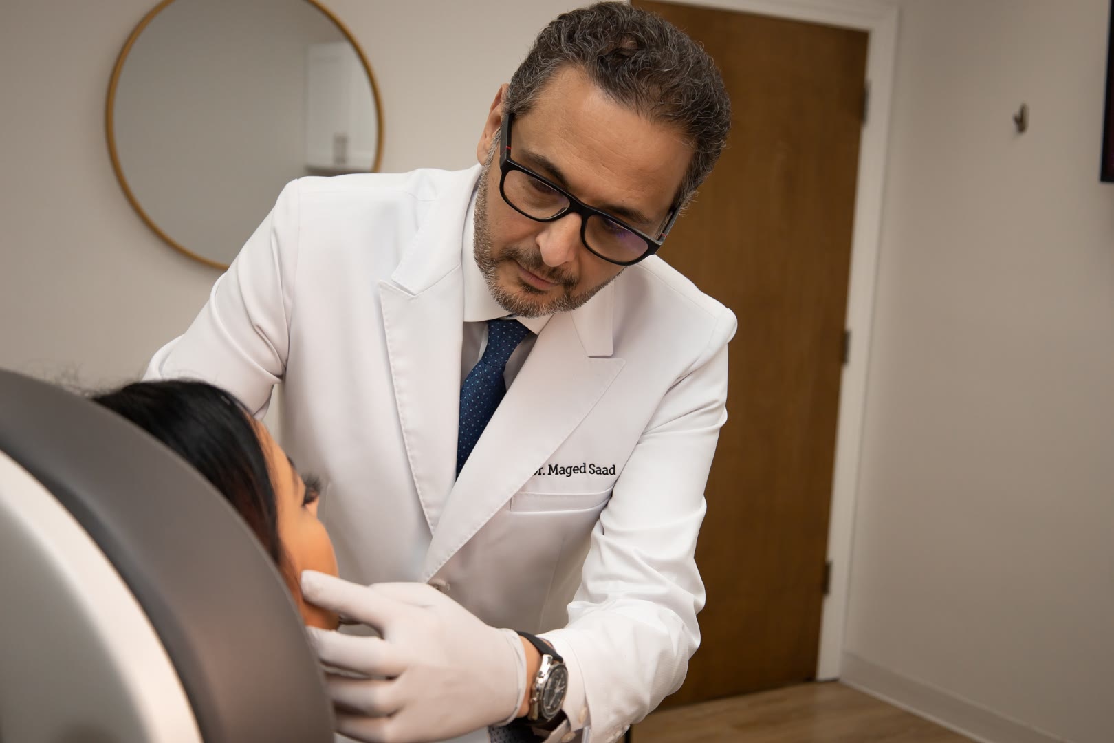 Dr. Saad performing a precision treatment at Healing Aesthetics